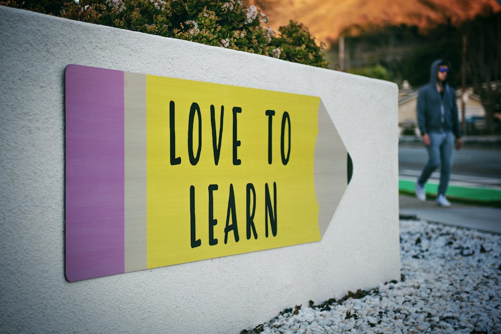 a signboard of love to learn