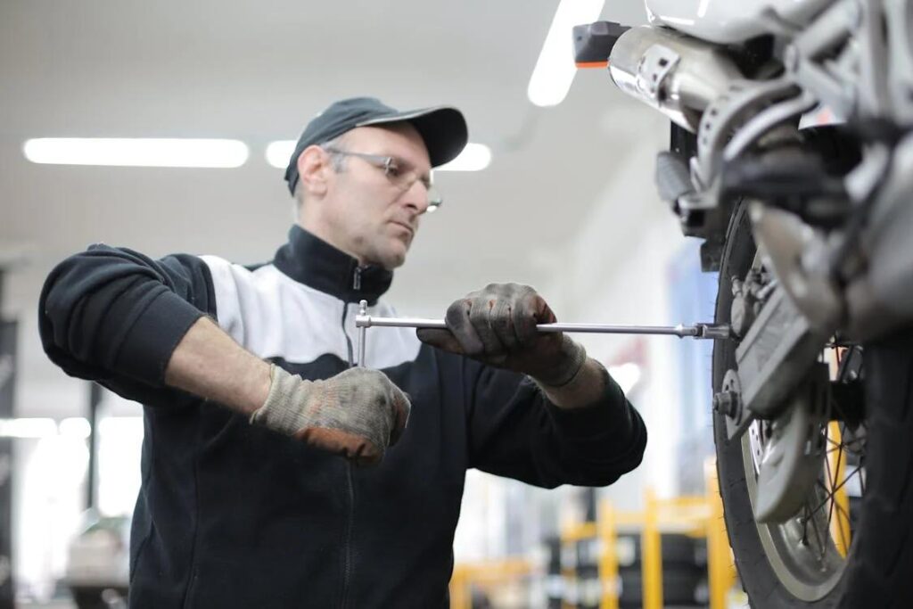 A mechanic working in an auto repair shop.