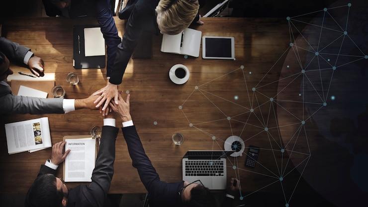 People working in an office with laptops